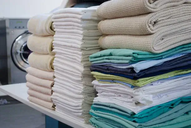 Clean and bright laundry folding area at Lux Laundromat